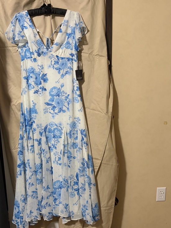 CeCe Dresses & Skirts - CeCe White and Blue Floral Maxi Dress with Tie-Back V-Neck
